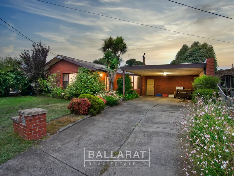 THREE BEDROOM BRICK HOME WITH DUAL LIVING