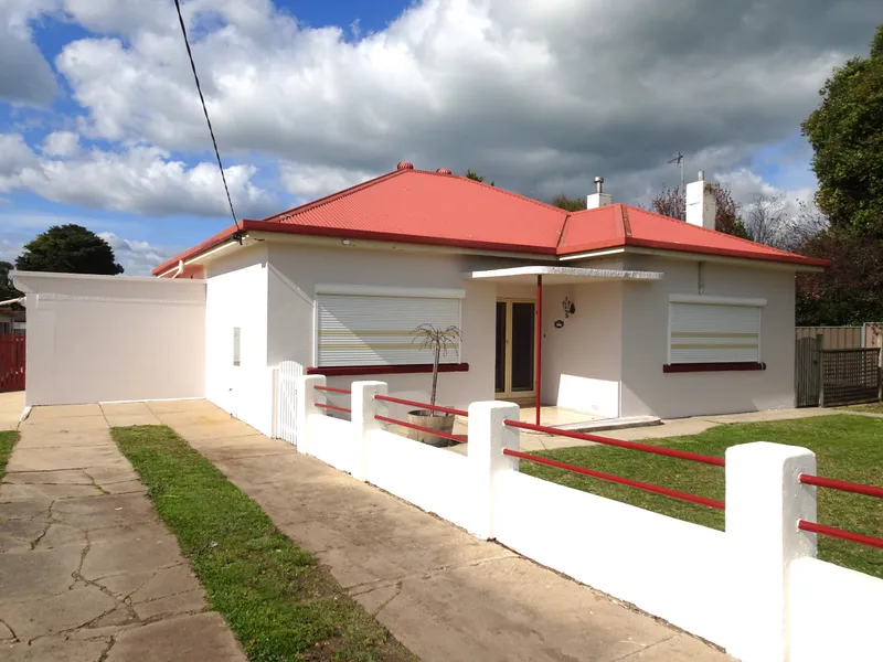 Super Neat Stone Home on a Double Block!