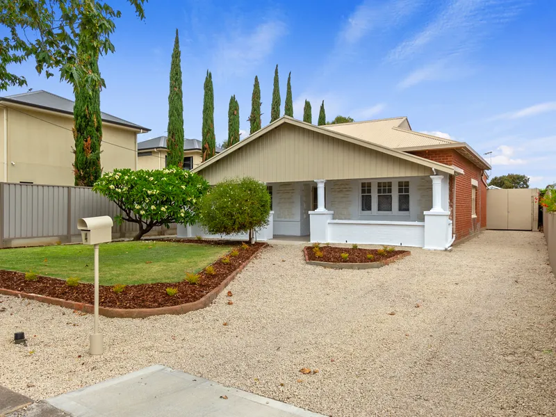 Timeless Elegance: Charming 1920's Home with Endless Potential and City Convenience