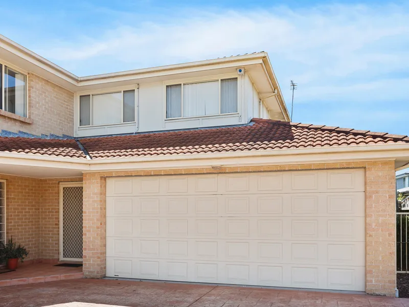 Spacious 3 Bedroom Townhouse with Double Car Garage
