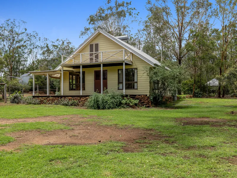 COUNTRY HIDE AWAY ON 40 ACRES WITH ABUNDANCE OF POTENTIAL!