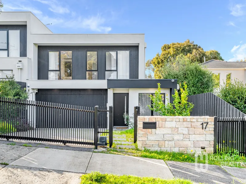 Styled with Sophistication, this Architectural Gem near Ruffey Lake Park is sure to Impress