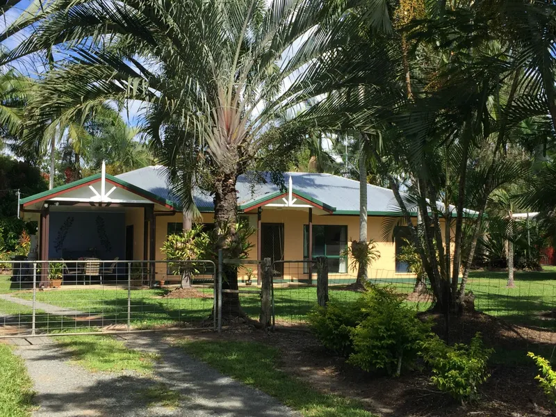 Two homes on two manicured acres