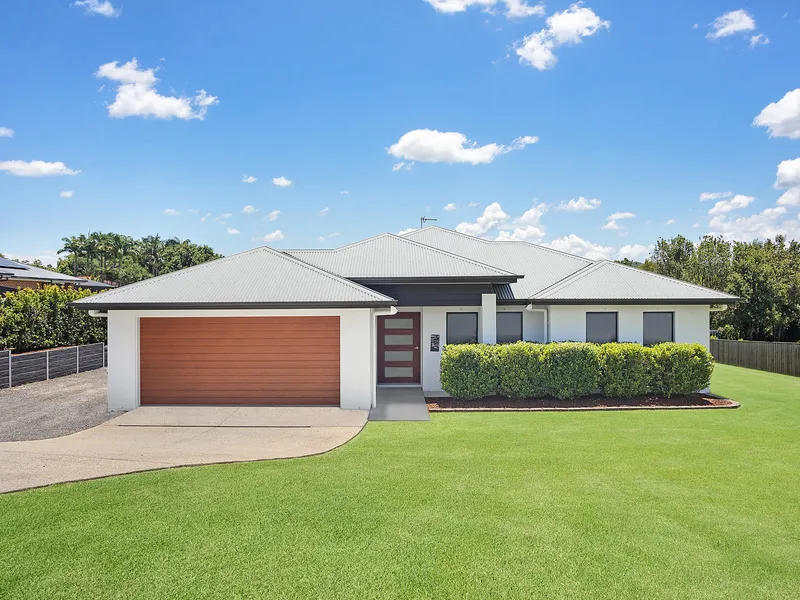 Immaculate family residence features high-end finishes on a half-acre parcel with side access and massive shed