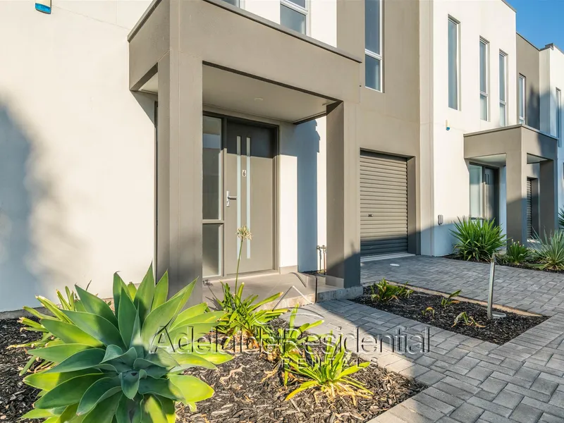 Near new three-bedroom townhouse in excellent location