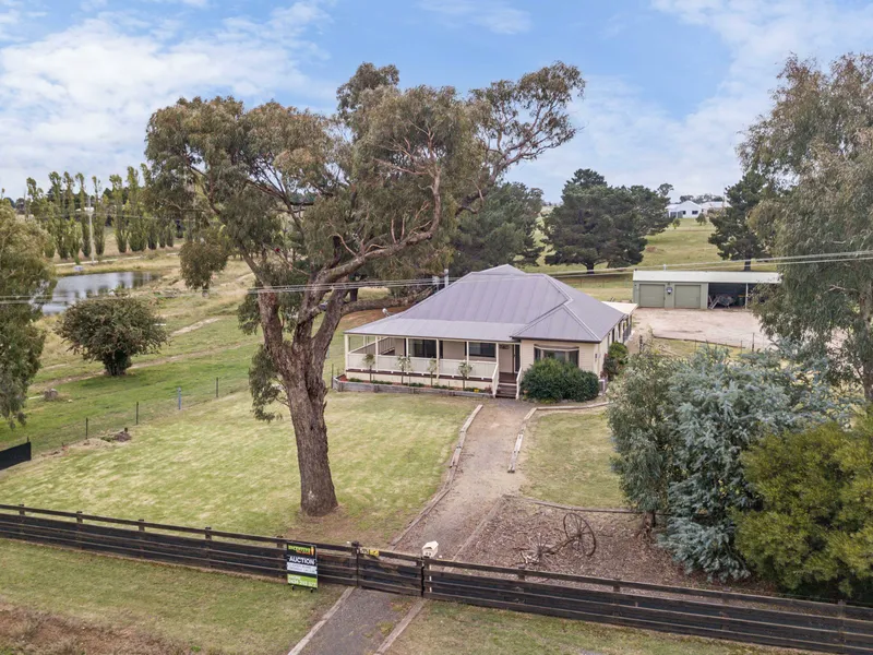 7 ACRES IN TOWN – LIVE IN OR SUBDIVIDE!