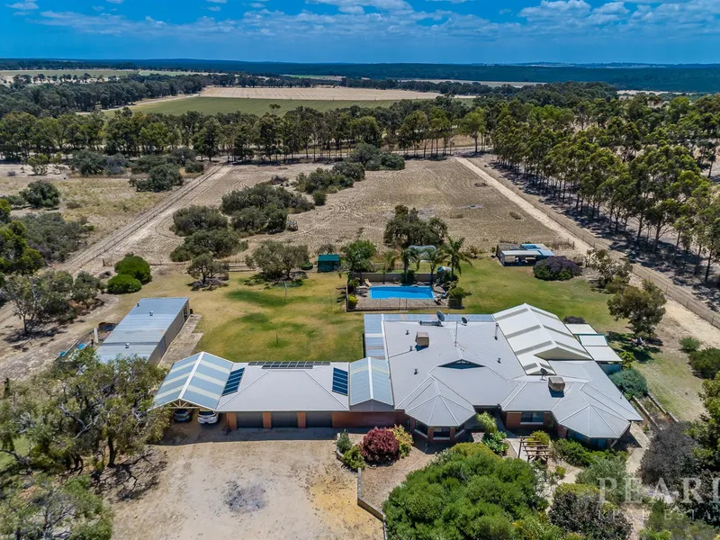 Massive 5.4 Acres with a 6x3 Home, Pool and Many Extra's!
