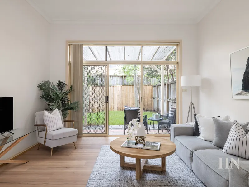 Dual courtyard townhouse of space and light