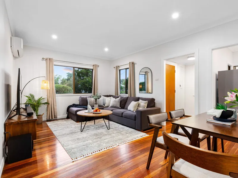 REFRESHED POST-WAR WITH SIDE ACCESS AND LARGE BACKYARD