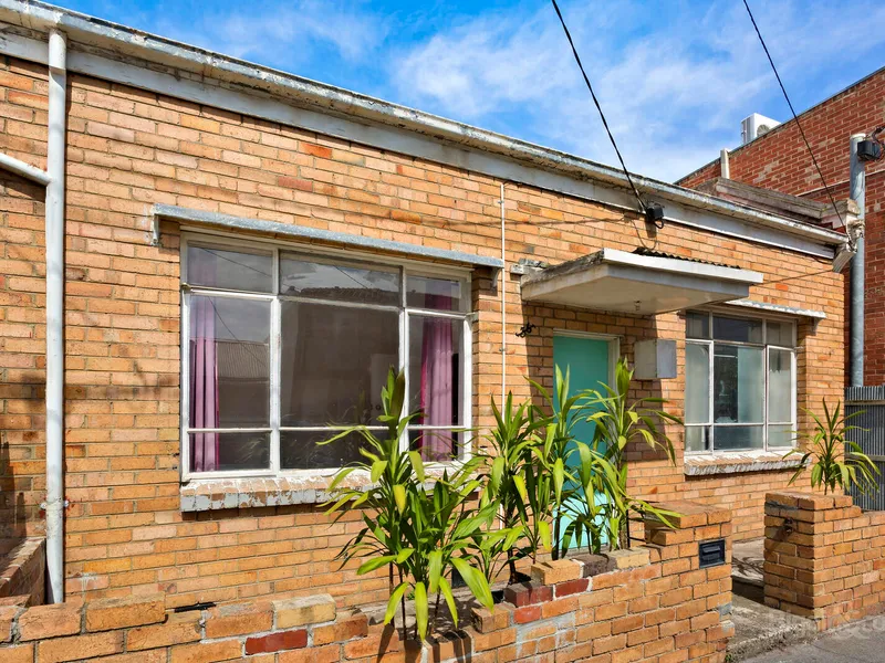 FAMILY SIZED HOME RIPE FOR RENOVATION OR RE-DEVELOPMENT