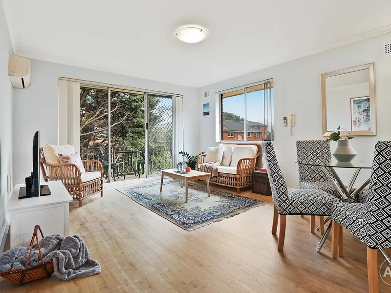 Top Floor Apartment with Garage + Underground Storeroom