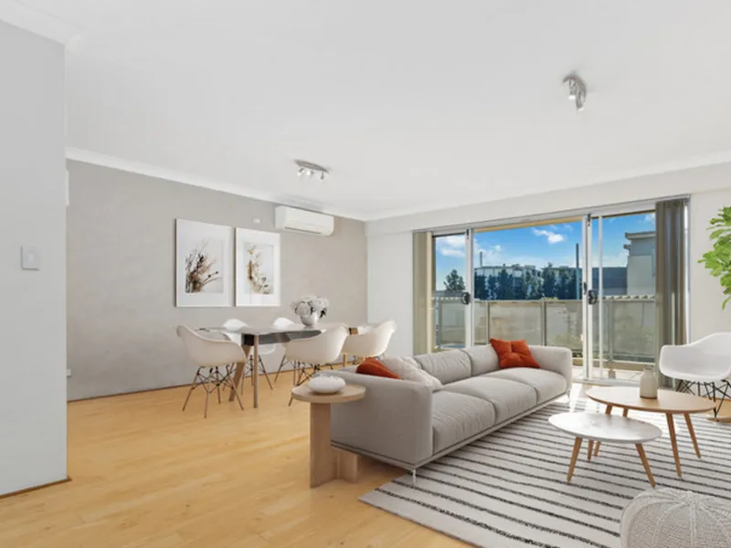 Central Marrickville 2-bed with sun-soaked private balcony & huge living/entertaining space