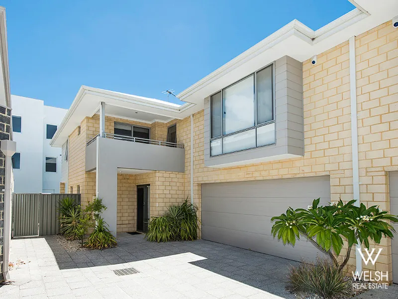 TOWNHOUSE LIVING AT ITS ABSOLUTE BEST!