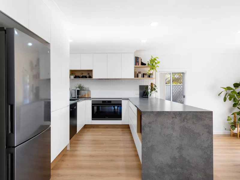 UNIQUE, STYLISH AND A COVETED LOCATION!