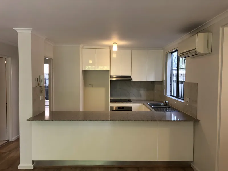 Prime Location - Stunning 2 bedroom courtyard unit