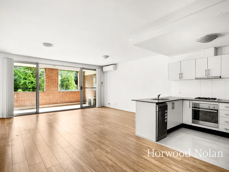 Modern 2 Bedroom Unit in Convenient Location - Brand New Flooring Installed