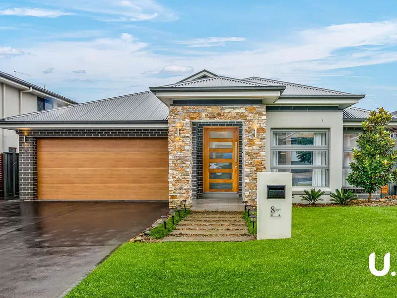 Entertainers delight with outdoor kitchen, theatre room and golf putting green!