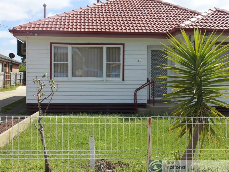 IN A QUIET SIDE STREET BUT CLOSE TO EVERYTHING, THIS WELL PRESENTED FAMILY HOME 