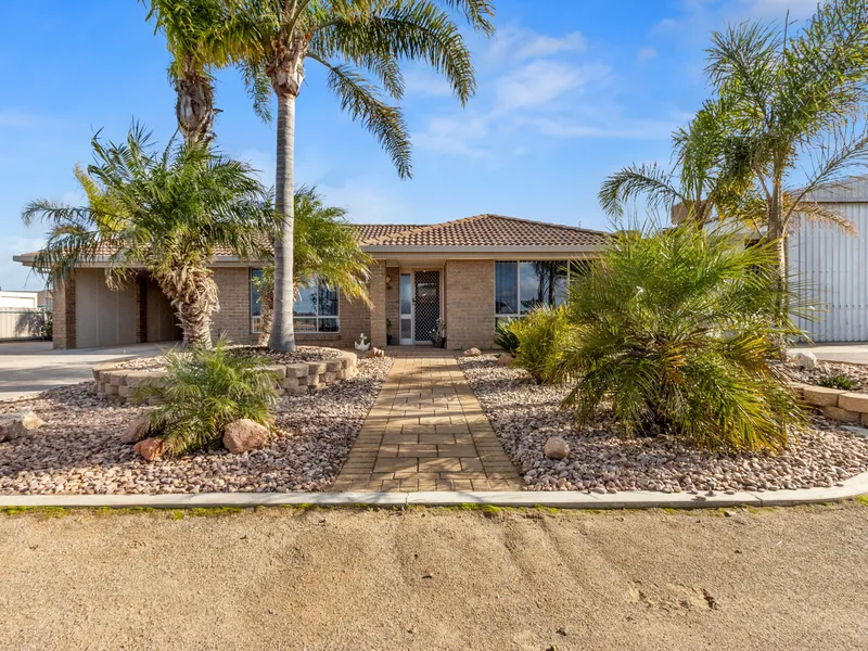 Corner Allotment with Extensive Shedding!