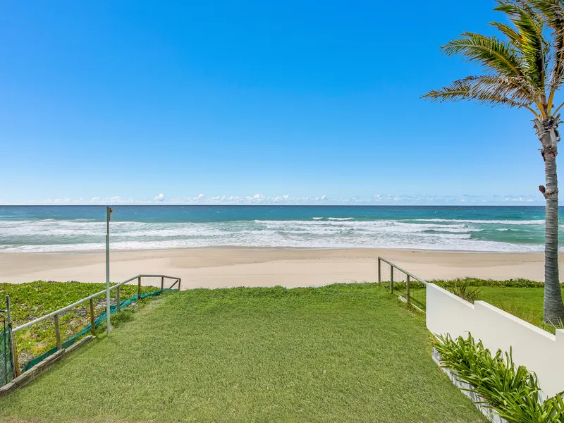 Absolute beach front living