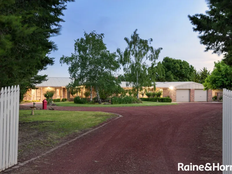 Lavish Country Living with Unrivaled City Views!  Land size 27.4 Arcres Approx.