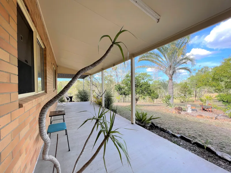 3bed double brick home with an array of exotic fruit trees and seasonal creek