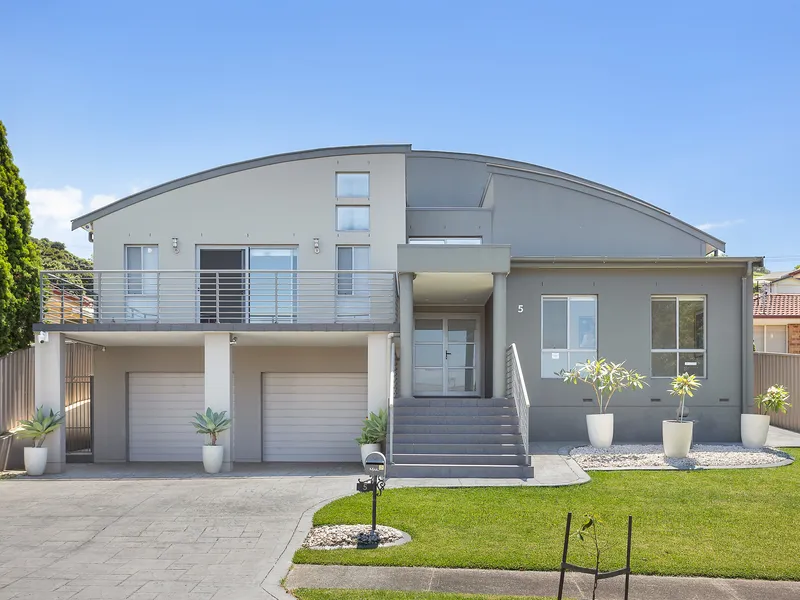 Stunning architect designed home provides contemporary family living at its best.