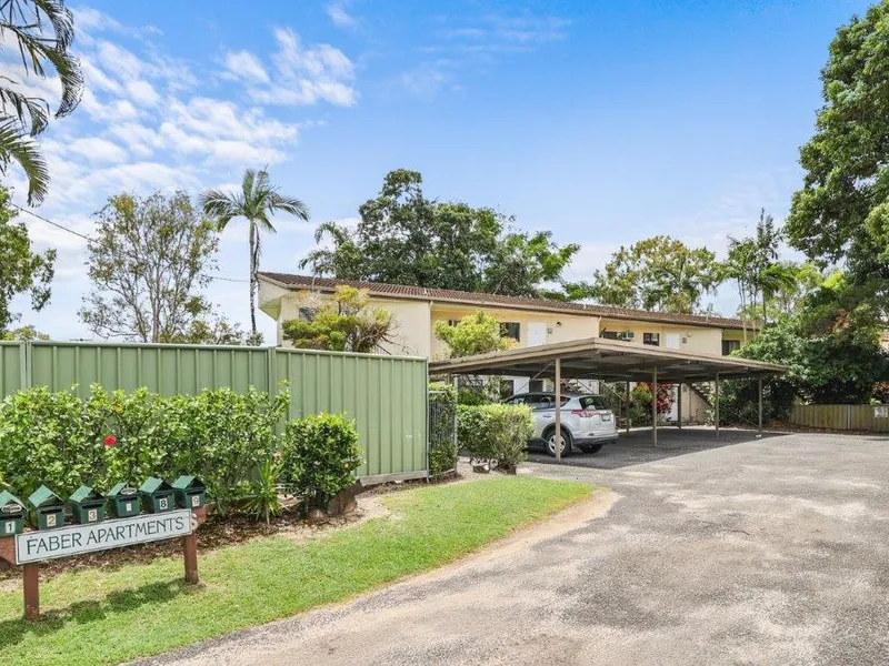 Fully air conditioned 2 bedroom upstairs apartment - private balcony overlooking park