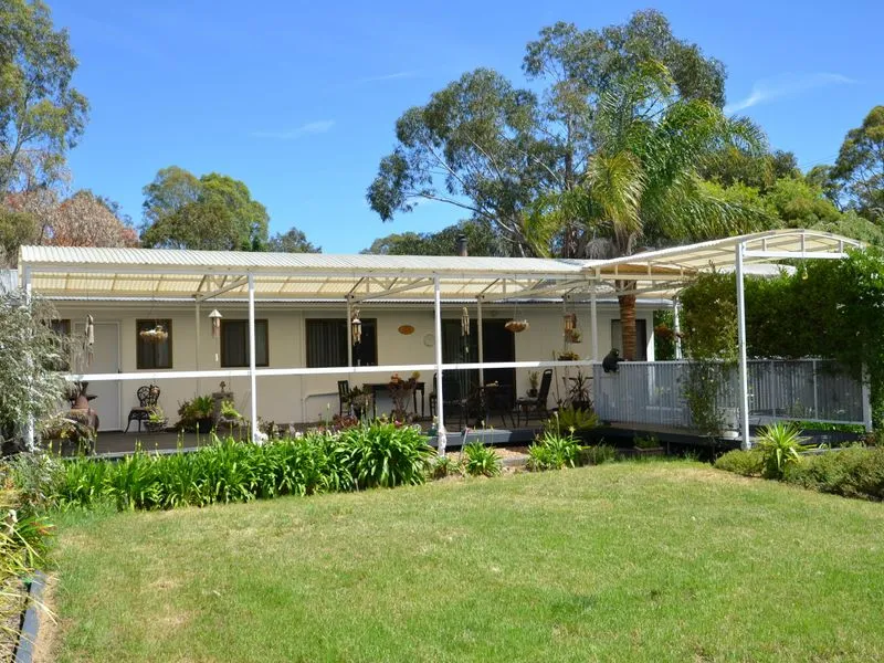 Lovely three Bedroom home on 3 Acres (approx)