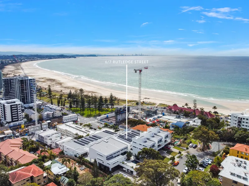 Stroll to the sands of Kirra from a luxurious modern haven
