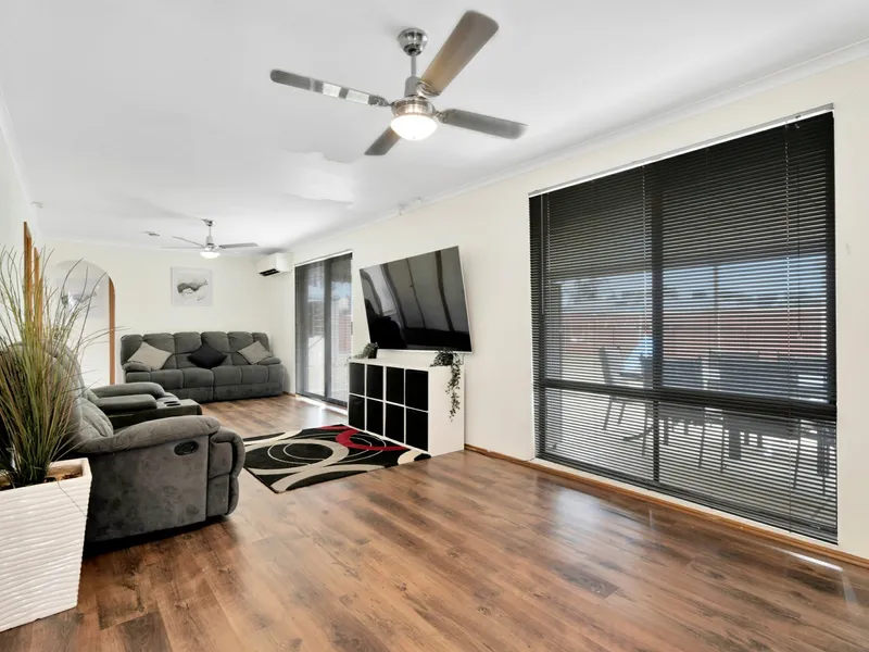 A HOME MADE FOR INDOOR/OUTDOOR ENTERTAINMENT ON A CORNER BLOCK