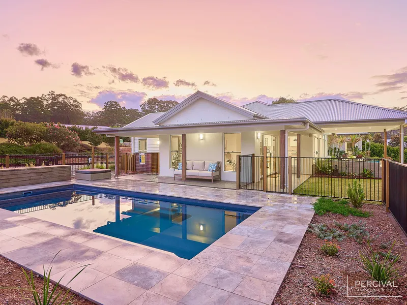 Private & Immaculate Level Living with 5 Garages