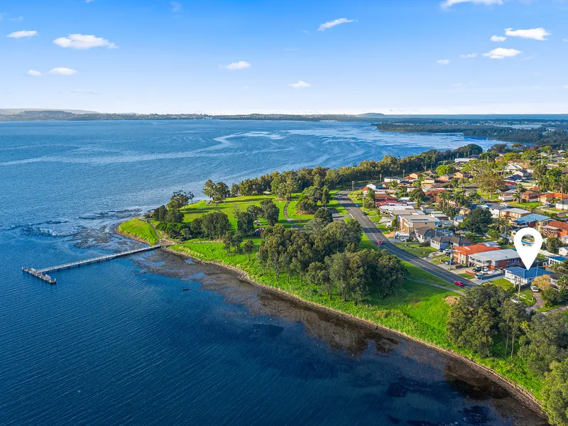 Two Stunning Homes With Lake Views !