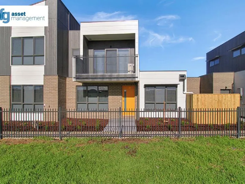 Stunning 3-bedroom townhouse with reverse living & Double Garage. Be the first tenants