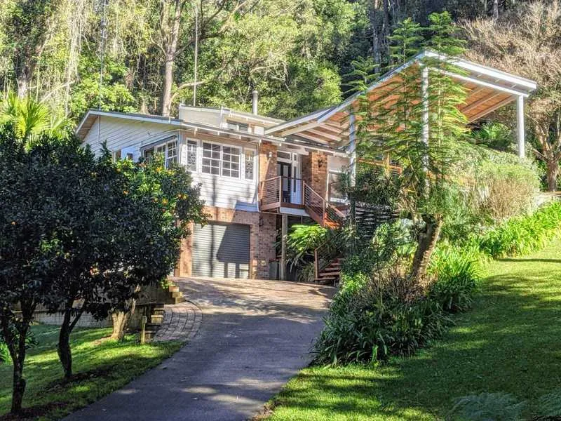 A luxury house set in pristine rainforest, an hour from Sydney.