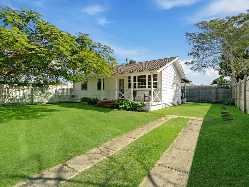 Neat cottage with picket fence, plus duplex or triplex potential!