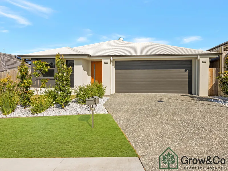 MODERN 4 BED HOME WITH LARGE FULLY FENCED BACKYARD