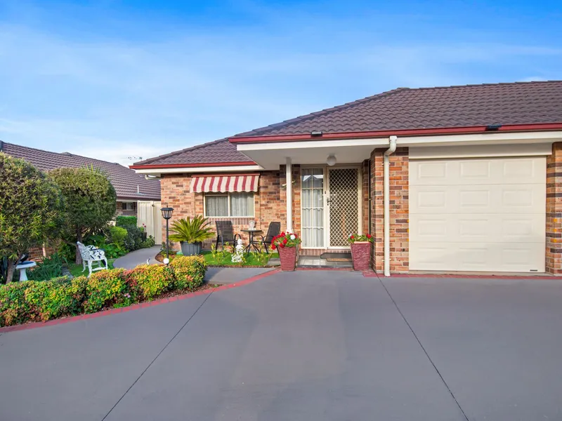 IMMACULATE TWO BEDROOM UNIT IN SECURE COMMUNITY