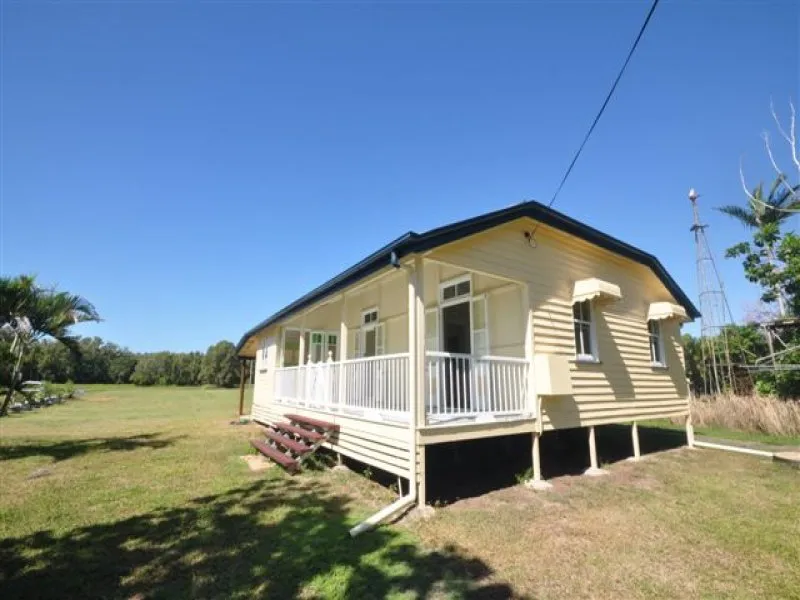 IMMACULATE COTTAGE ON HALF AN ACRE