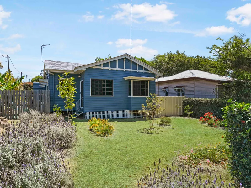Lovely character home with plenty of shed space!