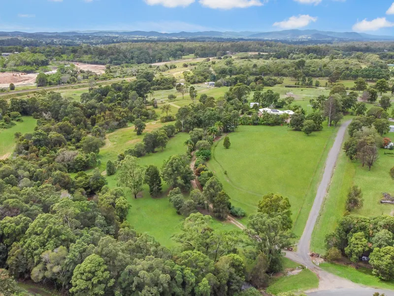 DUAL LIVING SET ON 7.7 ACRES