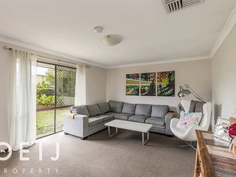 RENOVATED CHARMER ON AN UNUSUAL BIG BLOCK!