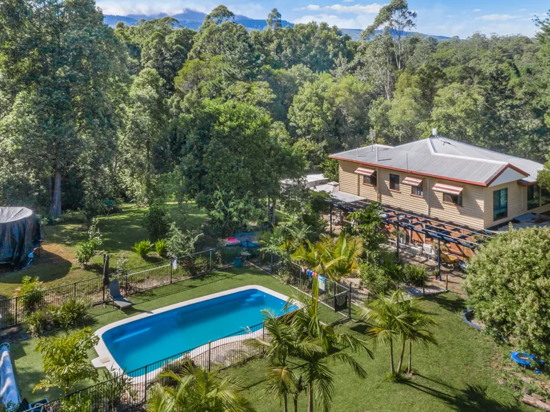 5 Acres with town water, views and river frontage.