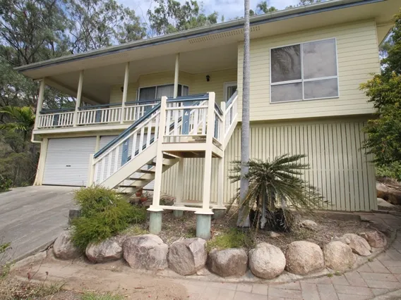 ELEVATED MODERN STYLE QUEENSLANDER WITH WRAP AROUND VERANDA TO ENJOY YOUR VIEW TOWARDS THE HARBOUR
