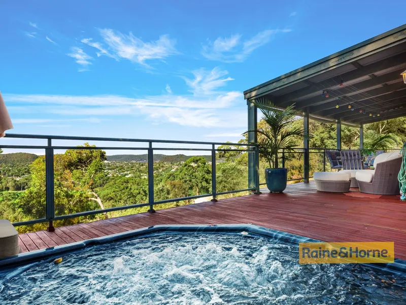 STUNNING HOME WITH VIEWS !