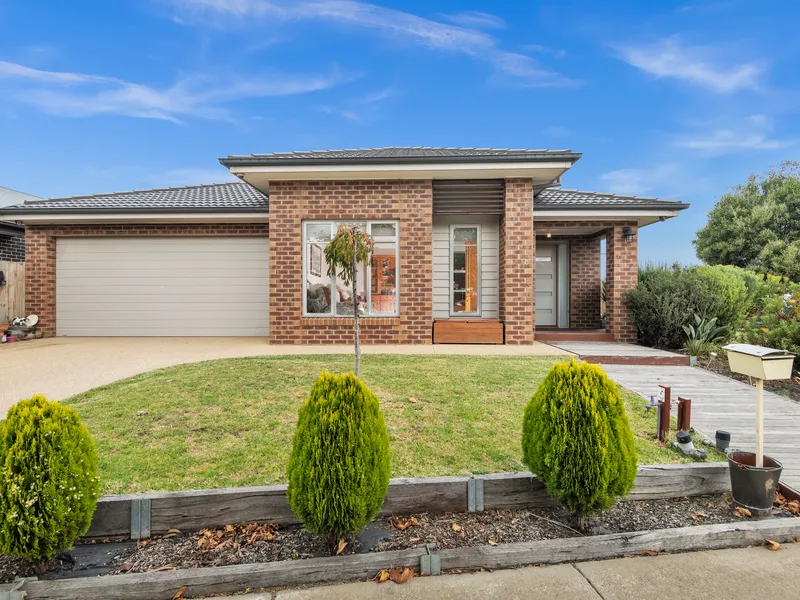 Large family home surrounded by parkland.