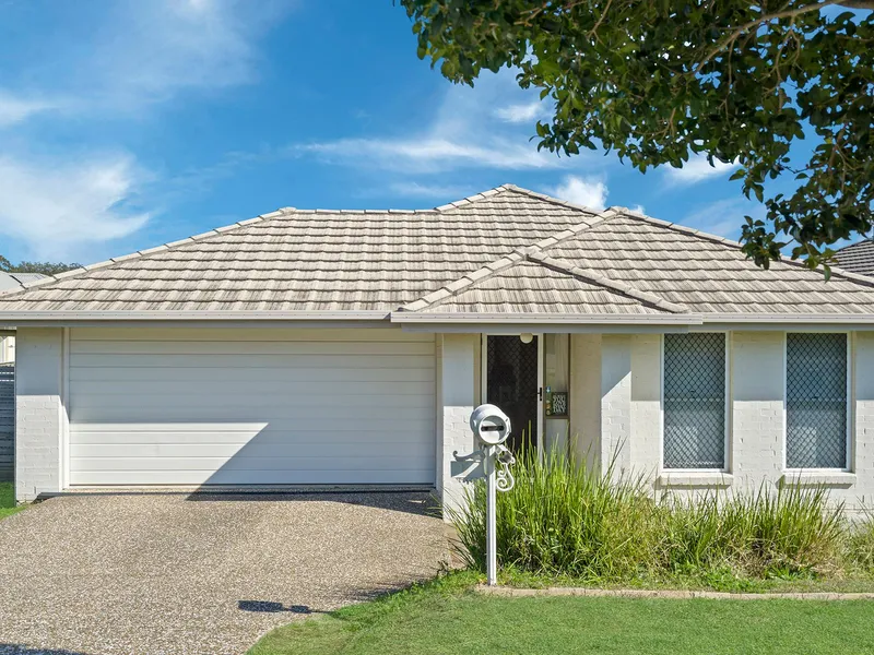 QUALITY FAMILY HOME WITH TWO LARGE LIVING AREAS