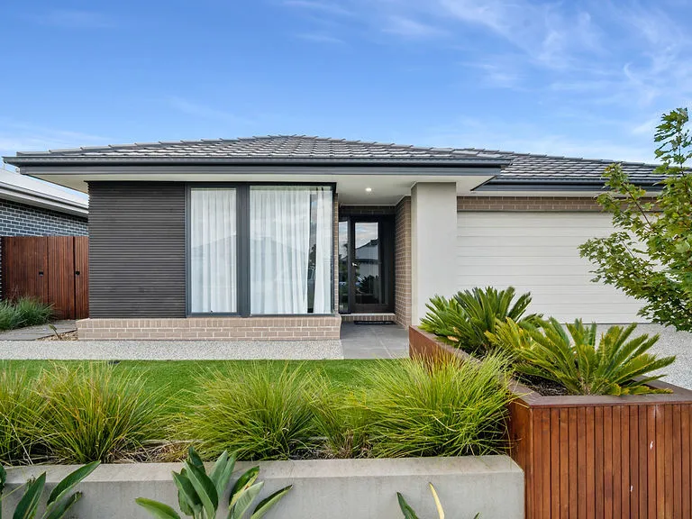 Designer luxury in Lucas with additional parking!