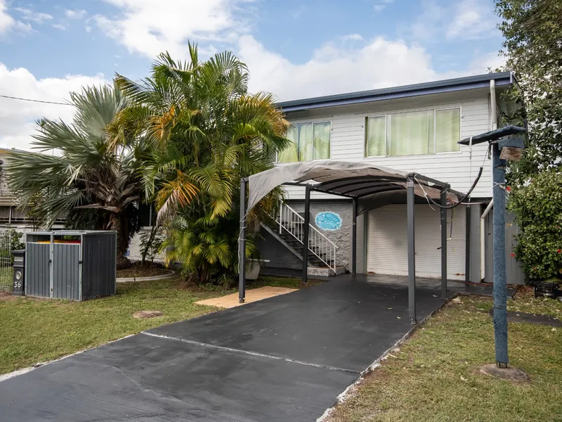 SOLID HOUSE ON CORNER LOT