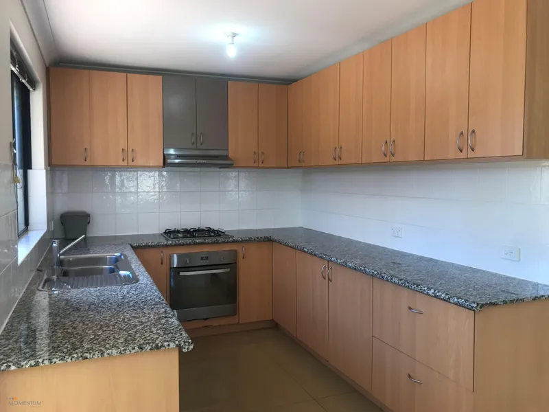 LOW MAINTENANCE HOME IN A GREAT LOCATION